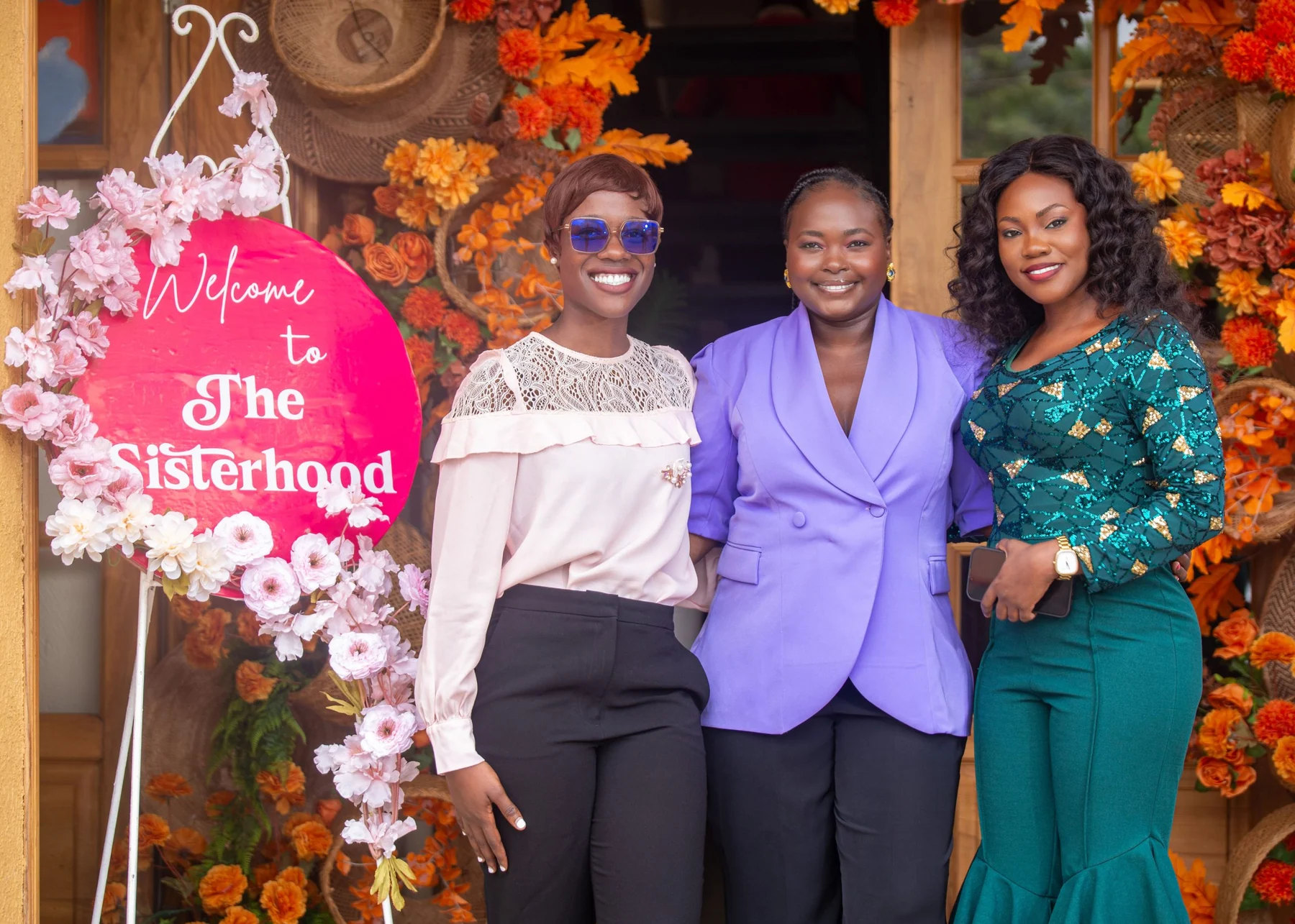 Three TASN community members photographed at a sisterhood gathering